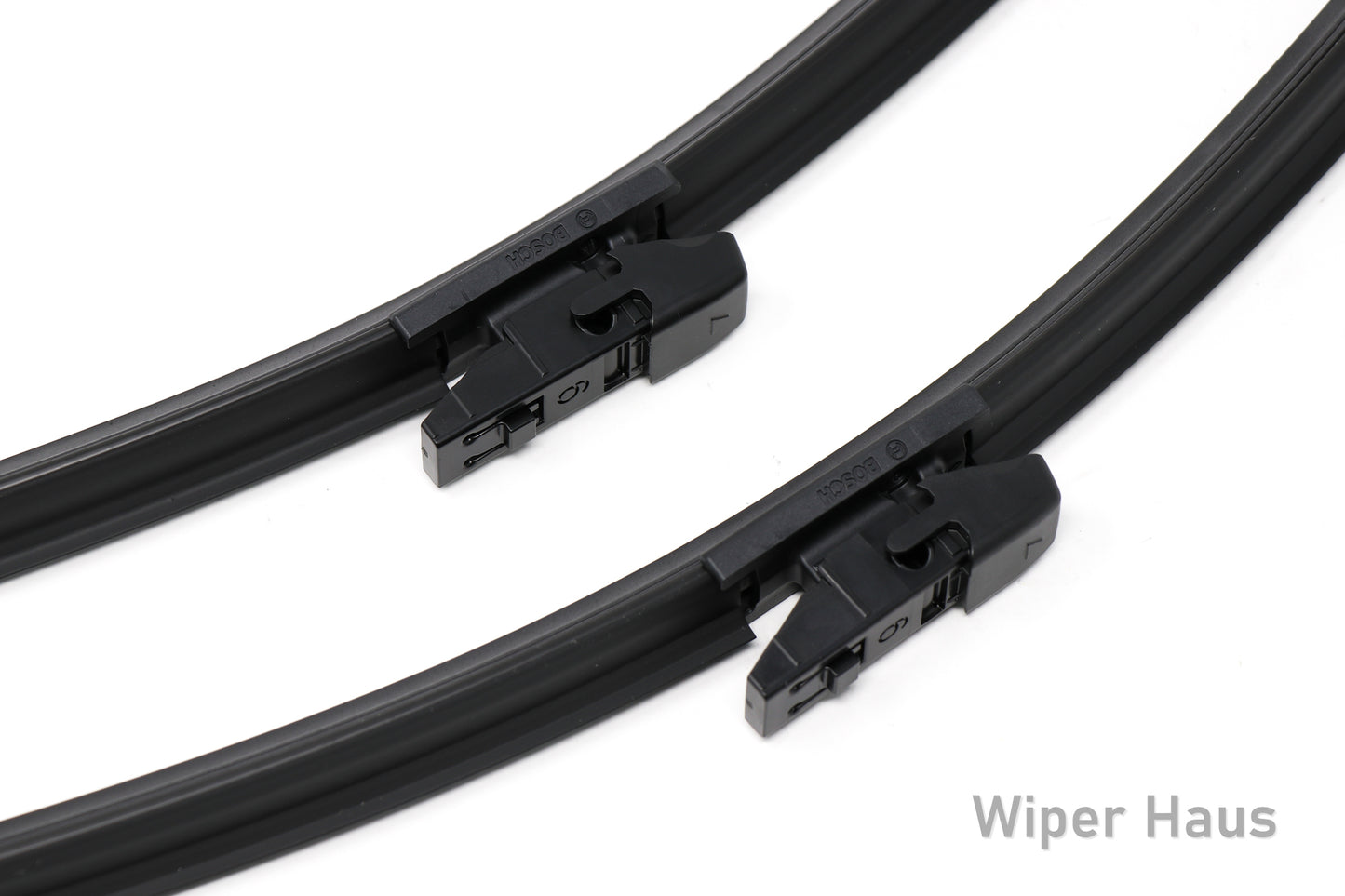 2 bosch aerotwin front wiper blades on white background