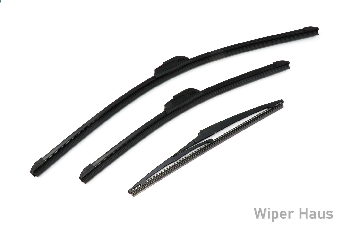 Two Bosch Focus and one Bosch Rear wiper blades on white background