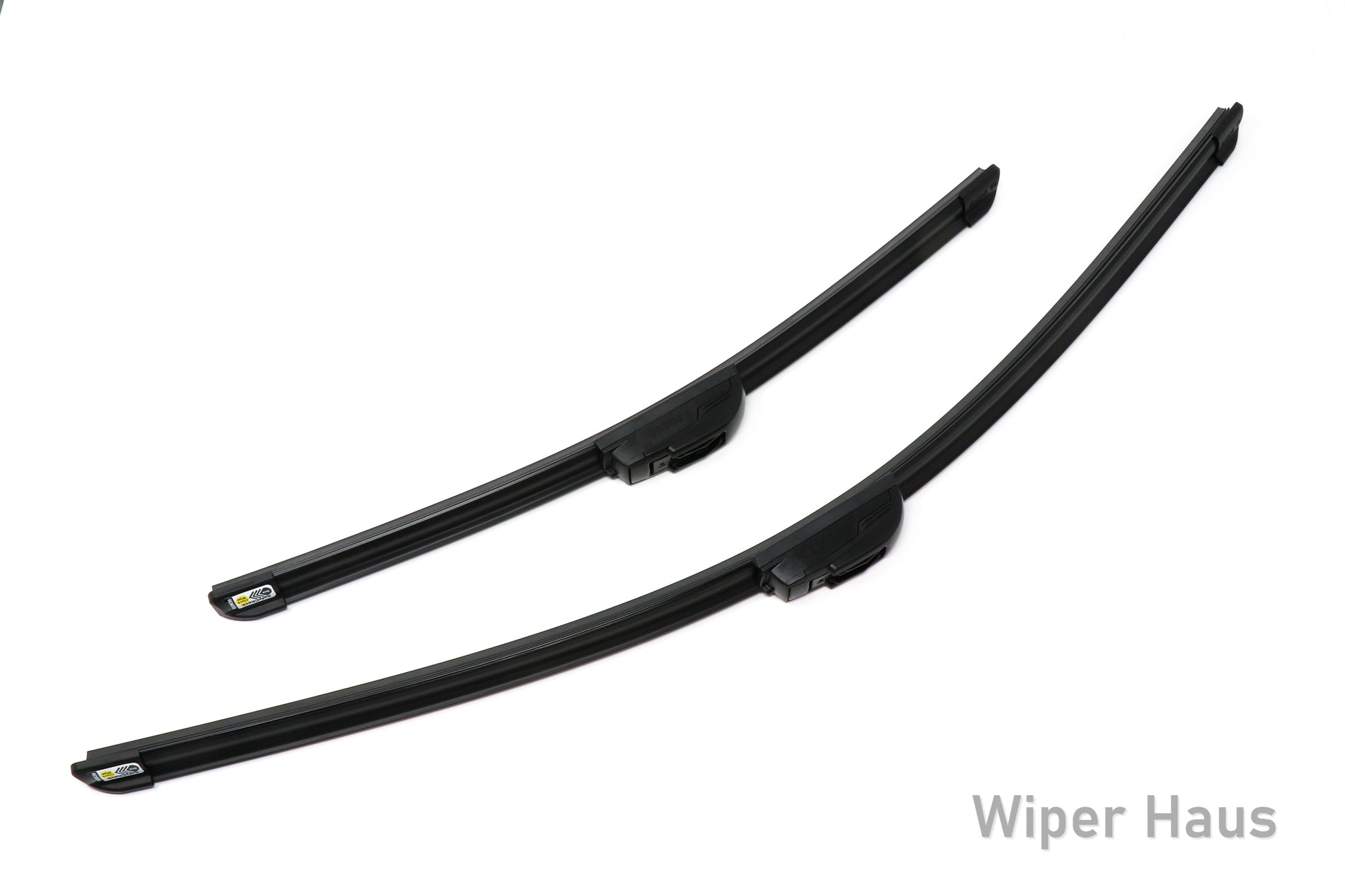Two Bosch Focus wiper blades on white background