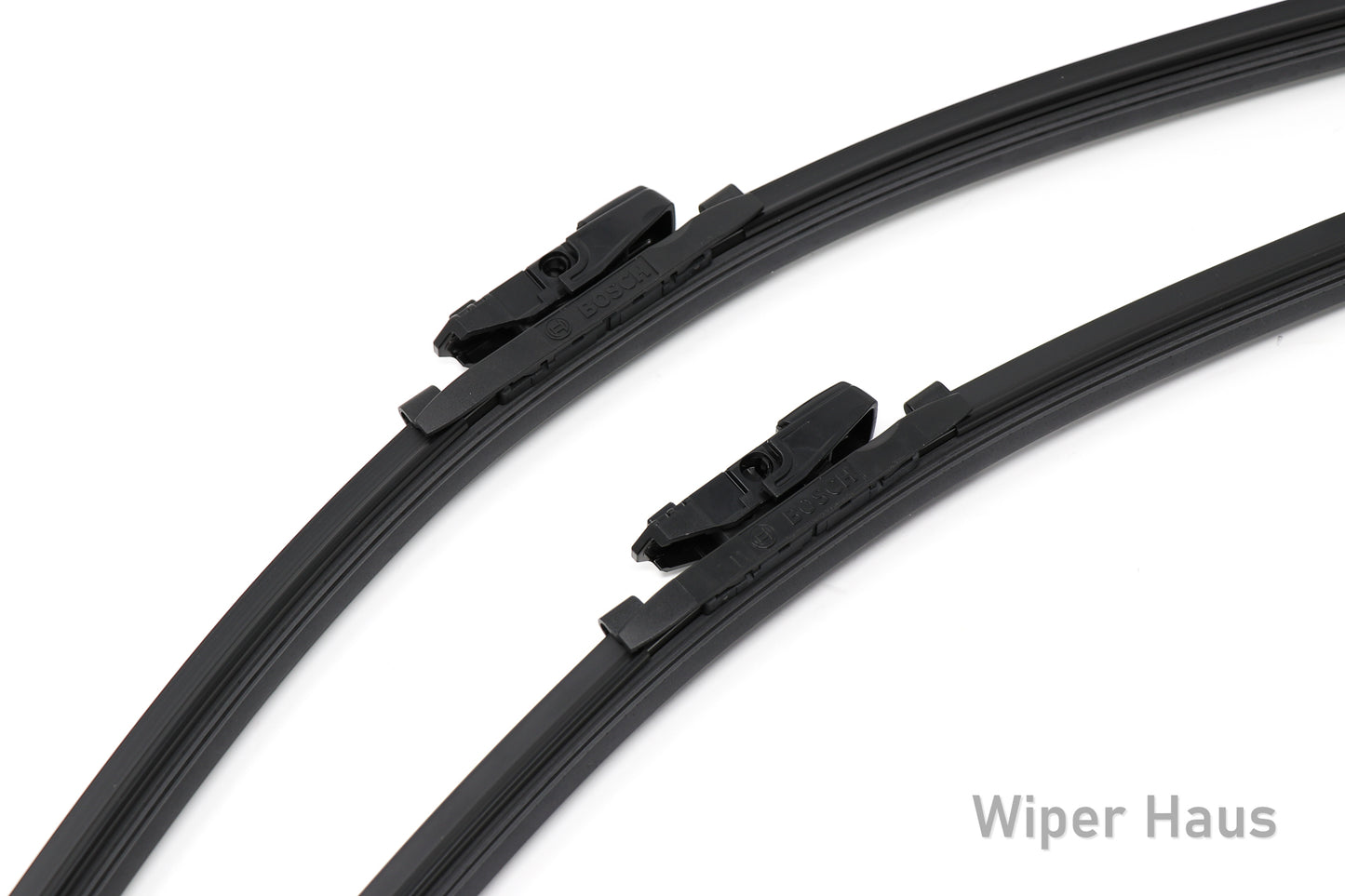 2 bosch icon front wiper blades on white background