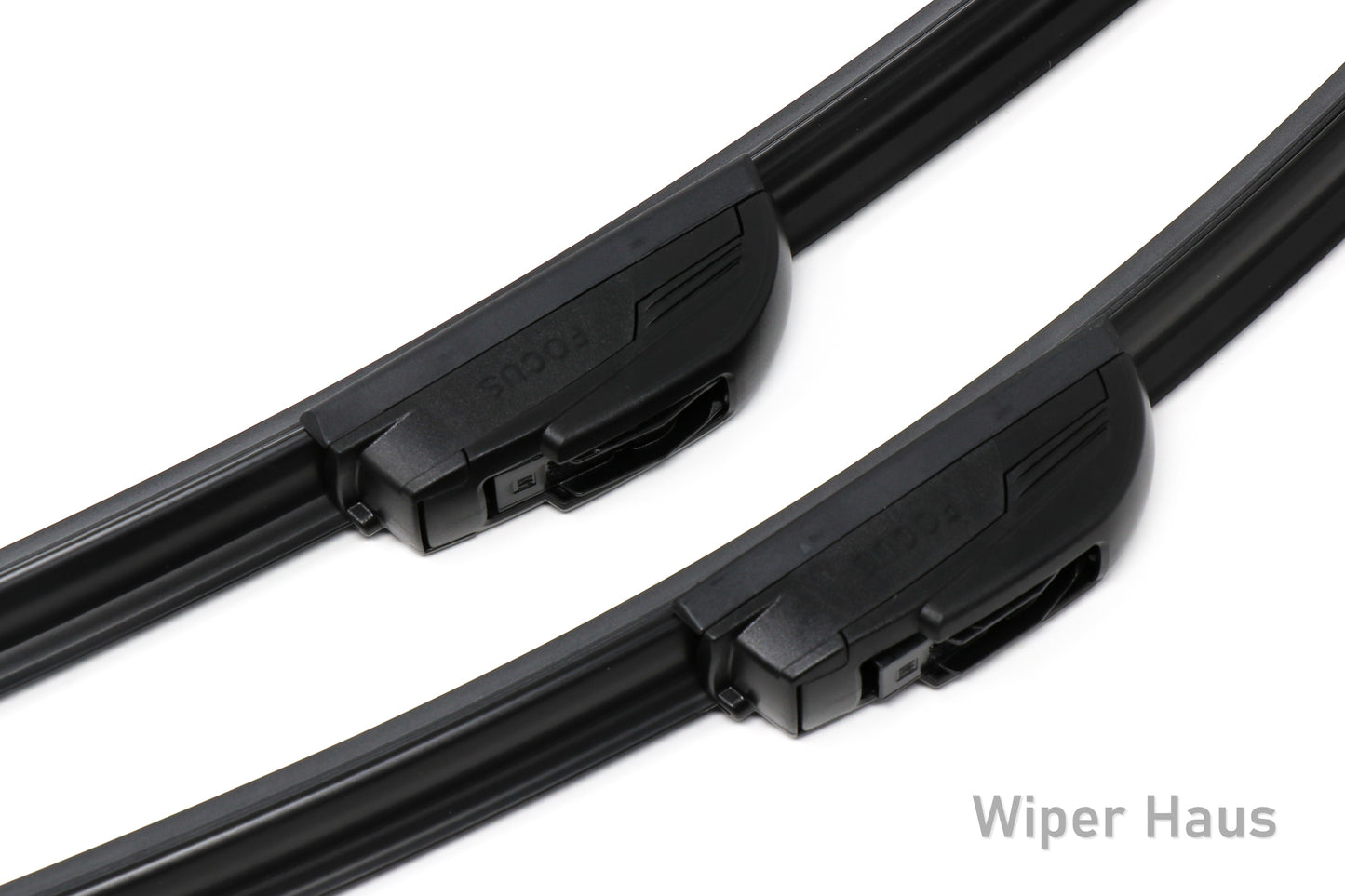 Detail view of two Bosch Focus wiper blades on white background