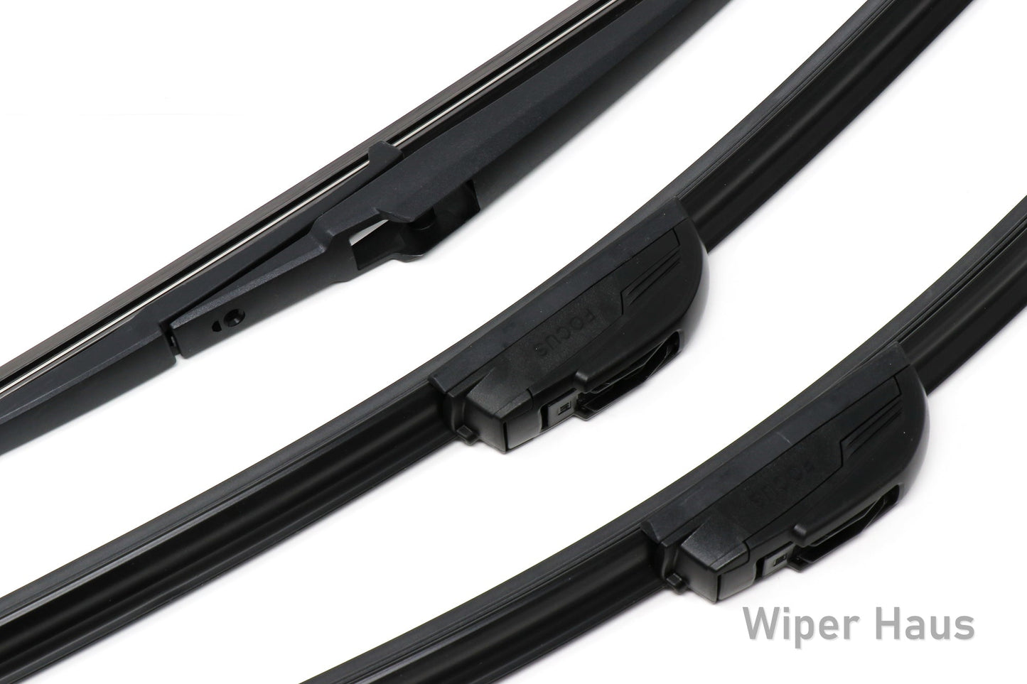Detail view of two Bosch Focus and one Bosch Rear wiper blades on white background
