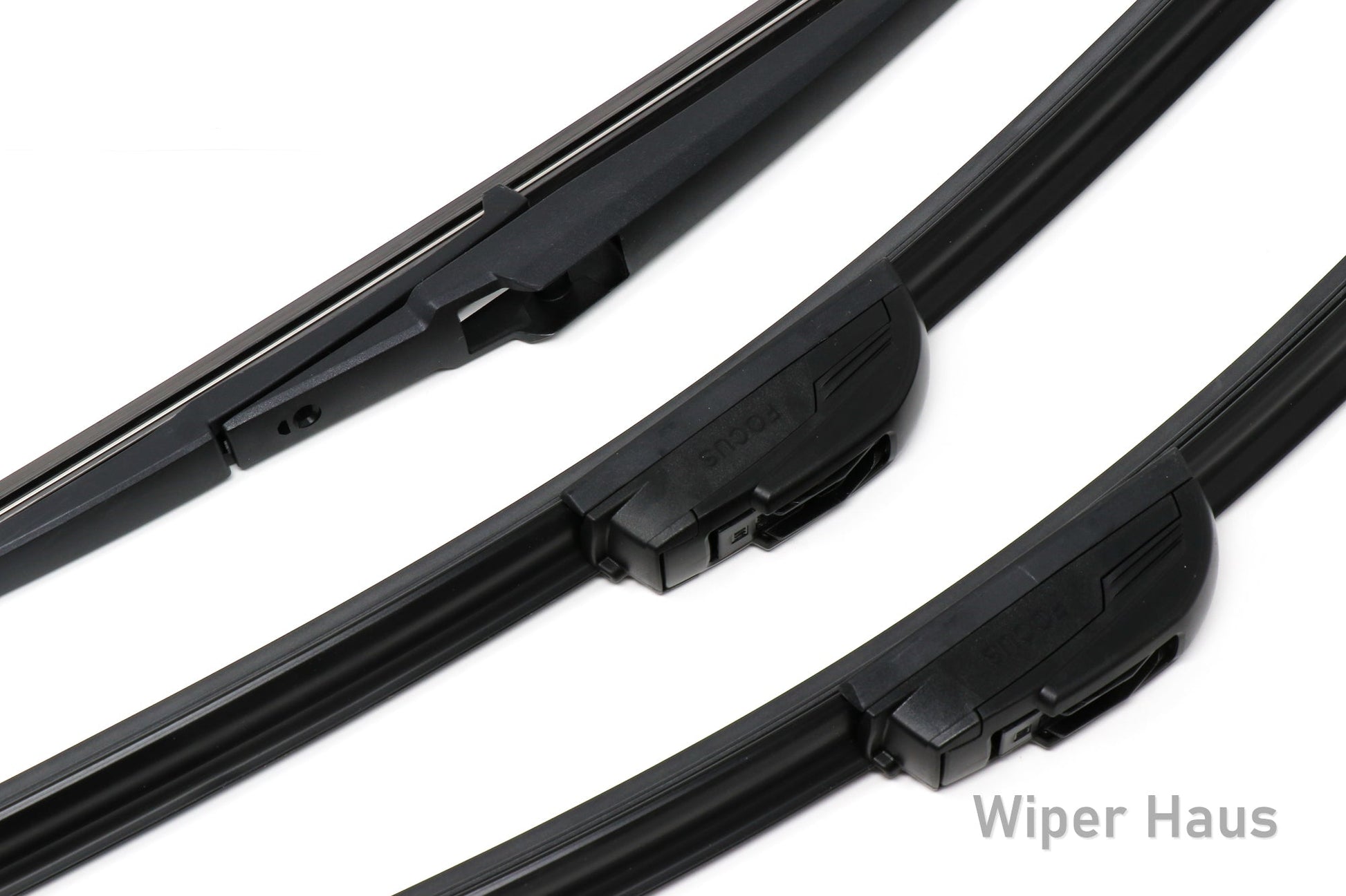 Detail view of two Bosch Focus and one Bosch Rear wiper blades on white background