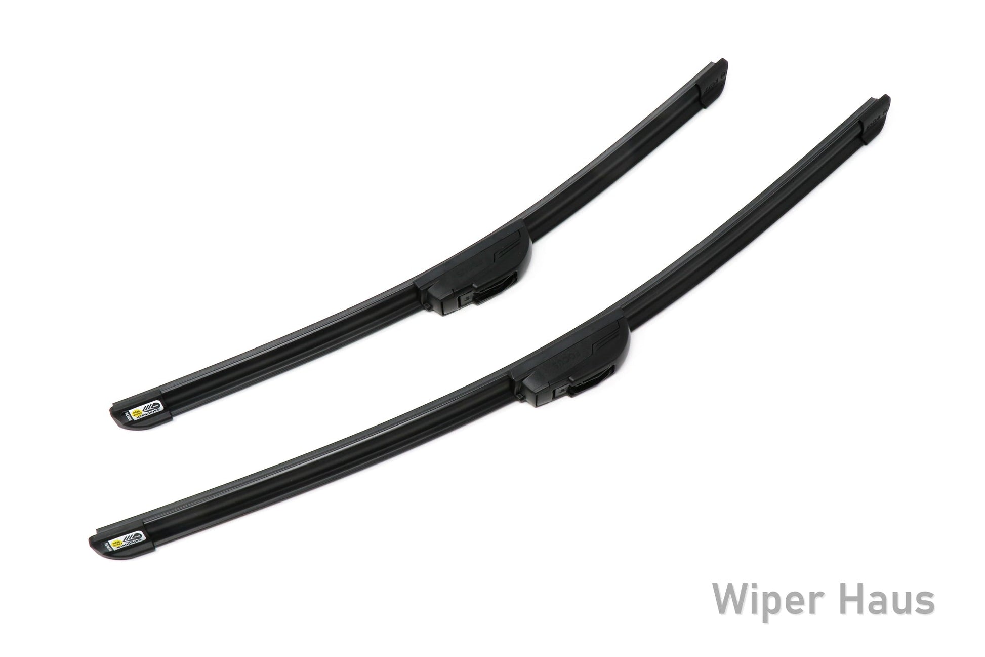 Two Bosch Focus wiper blades on white background