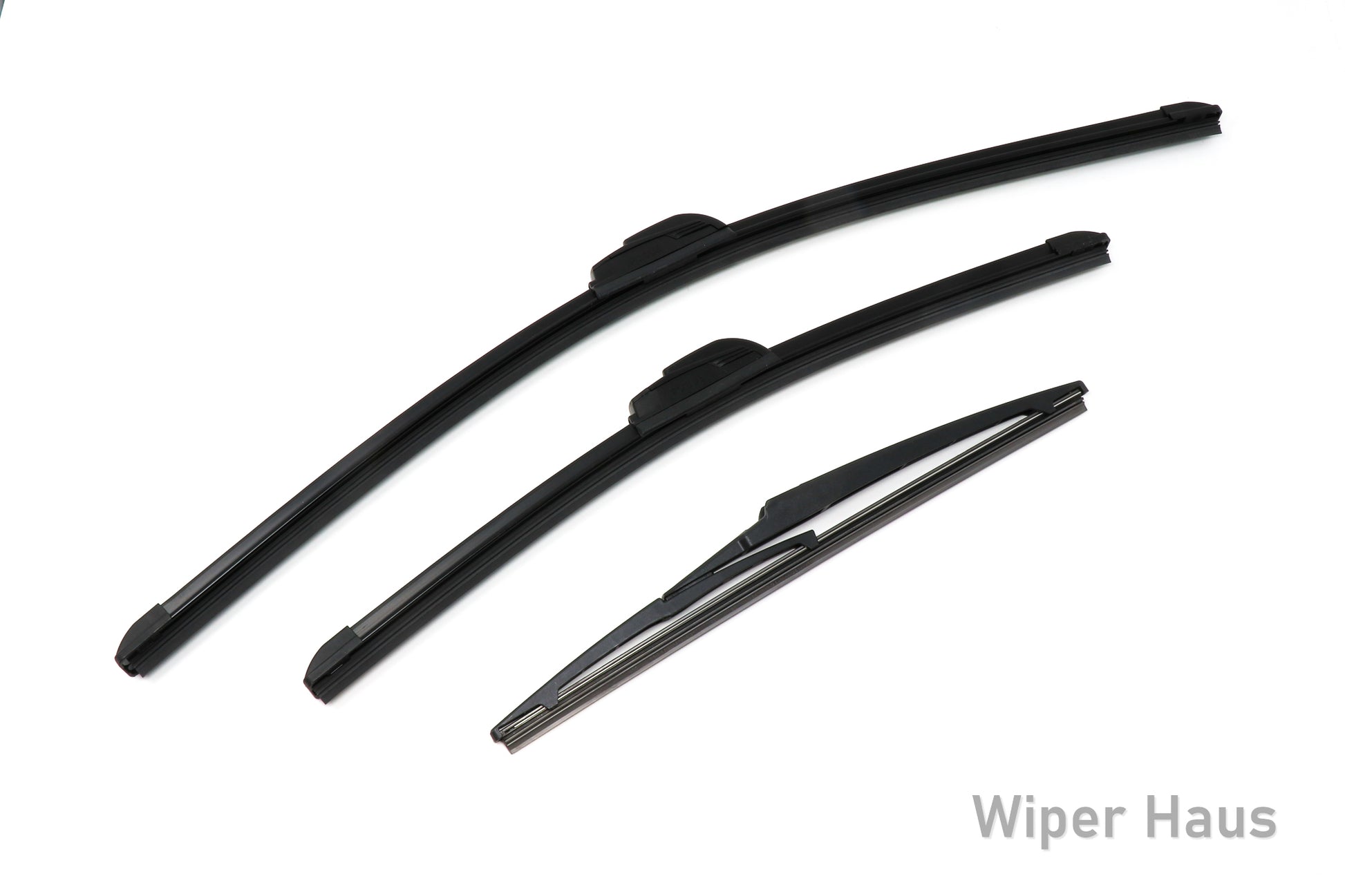 Two Bosch Focus and one Bosch Rear wiper blades on white background
