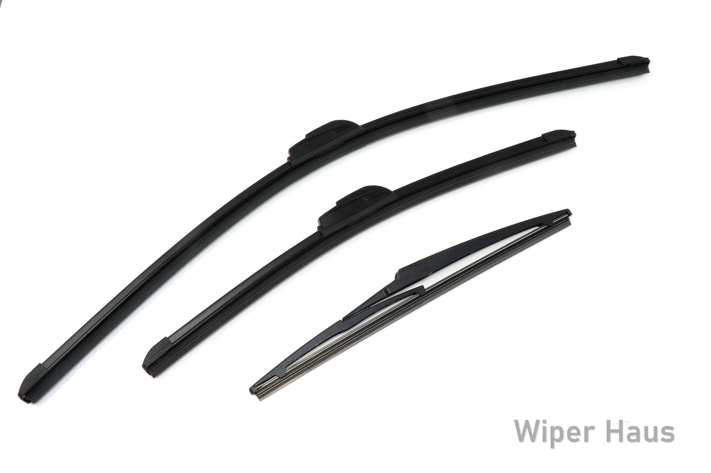 Two Bosch Focus and one Bosch Rear wiper blades on white background