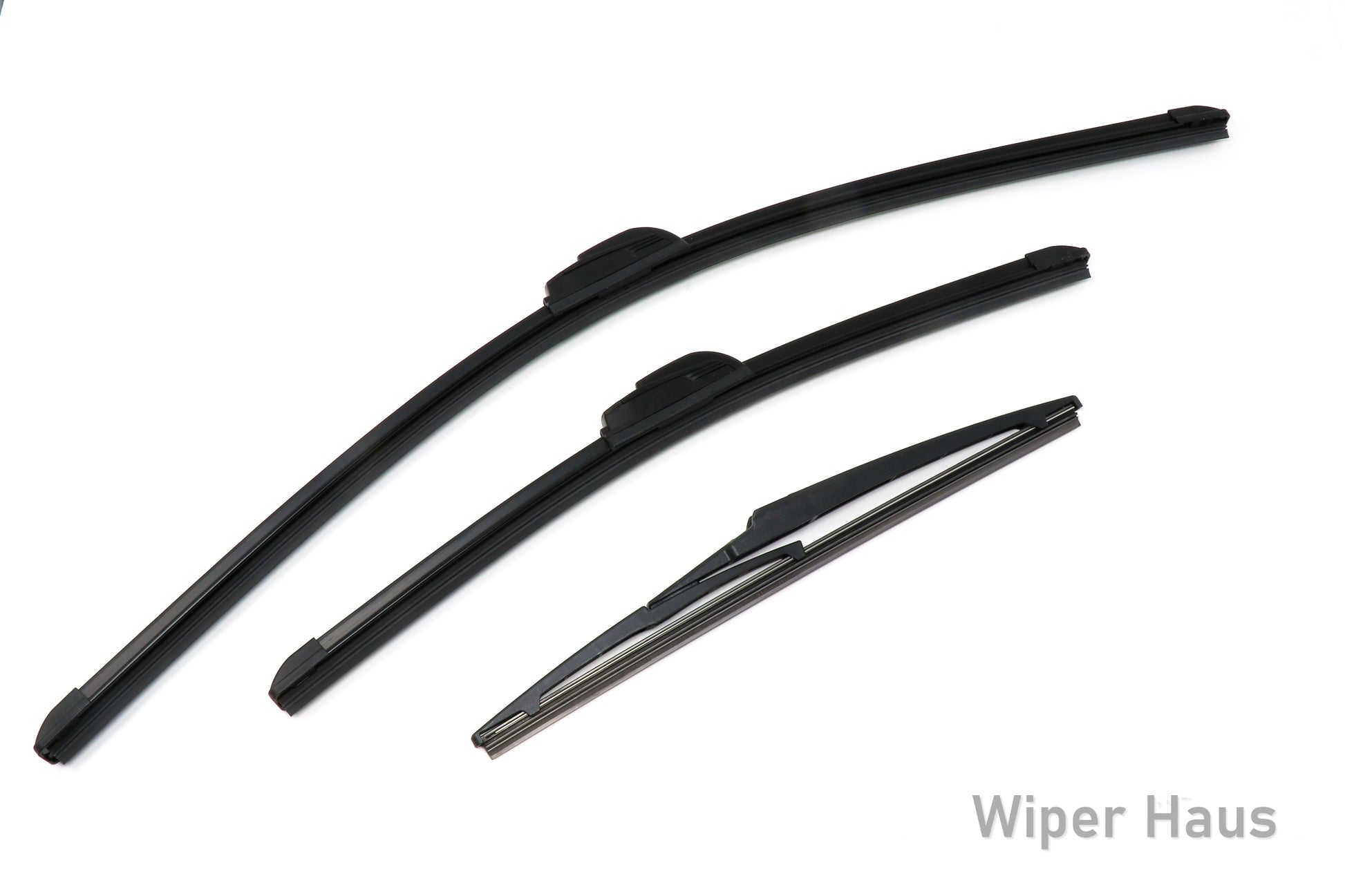 Two Bosch Focus and one Bosch Rear wiper blades on white background
