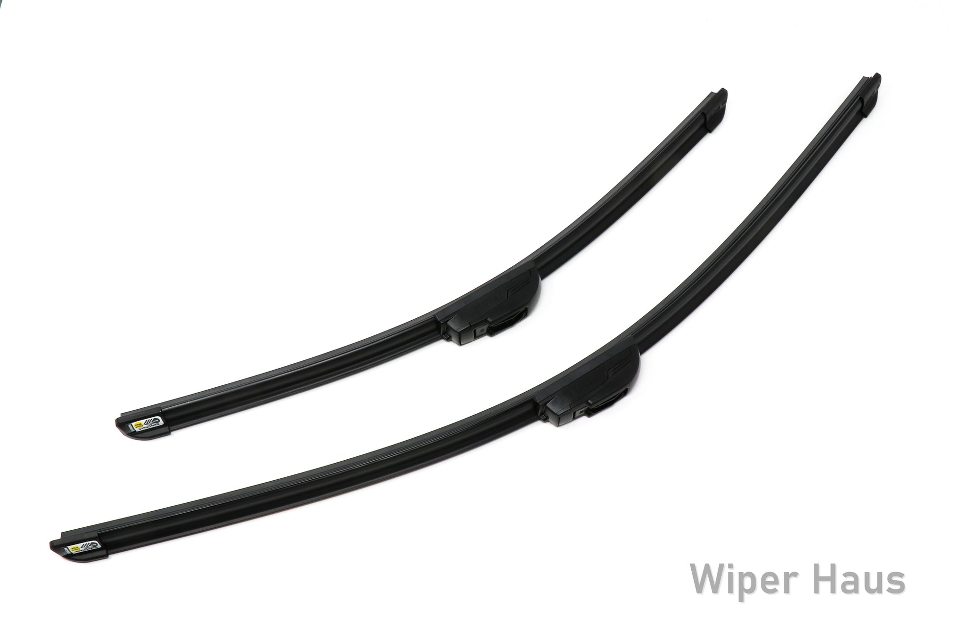 Two Bosch Focus wiper blades on white background