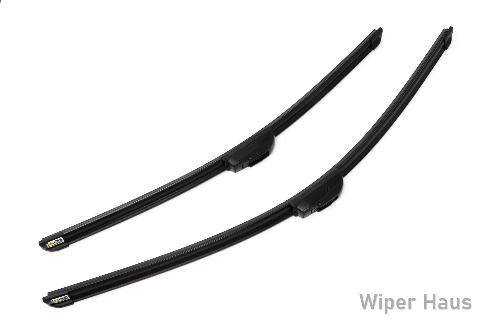Two Bosch Focus wiper blades on white background